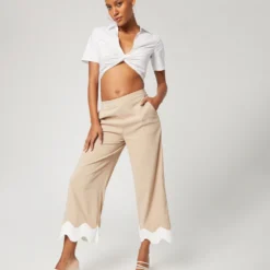 Pantalons Wide Leg Broek Nora Dames Beige / Crème -About You Winkel 13a0c54a70c1ac286132b5e698512f49 scaled