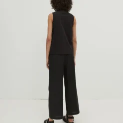 EDITED Pantalons Wide Leg Broek Nona Dames Zwart -About You Winkel 19aa7359fbd089e188a9667b9fac4be8 scaled