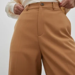 EDITED Pantalons Slimfit Broek Jeanelle Dames Beige -About You Winkel 5061f7e63671f2951ef789f2a1c6c612 scaled