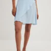 NA-KD Mini Rokken Rok Dames Blauw 1 NA-KD Mini Rokken Rok Dames Blauw -About You Winkel 5a085f45d451825fecb4c69d0961c3aa scaled
