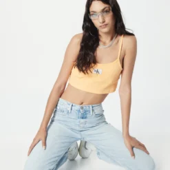 Calvin Klein Jeans Crop Tops Top Dames Pasteloranje 11 Calvin Klein Jeans Crop Tops Top Dames Pasteloranje -About You Winkel 65fc75b94548eee9d80182b553b450bb scaled