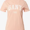 Gant T-shirts Shirt Dames Abrikoos -About You Winkel 7a3fc961ca9b789bcf6f68a56b6efef5 scaled
