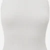 Tanktops Top Dames Wit -About You Winkel 938c77b51170935274449153dc58f7dd scaled