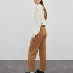 EDITED Pantalons Slimfit Broek Jeanelle Dames Beige -About You Winkel fe881812a7b7618f6cb3161cabdea863 scaled
